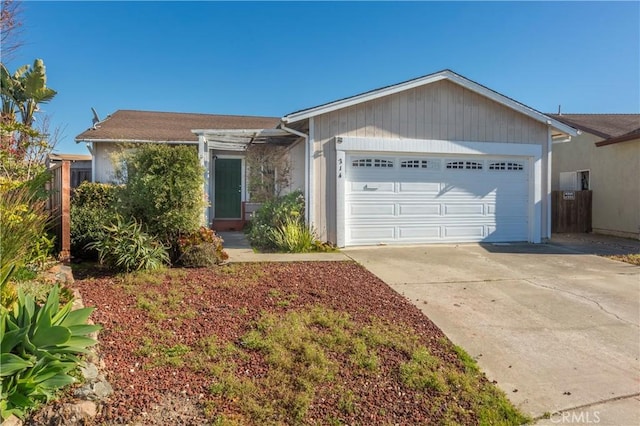 ranch-style home featuring a garage