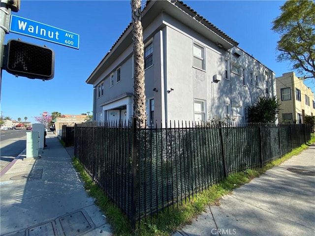 view of side of property with a garage