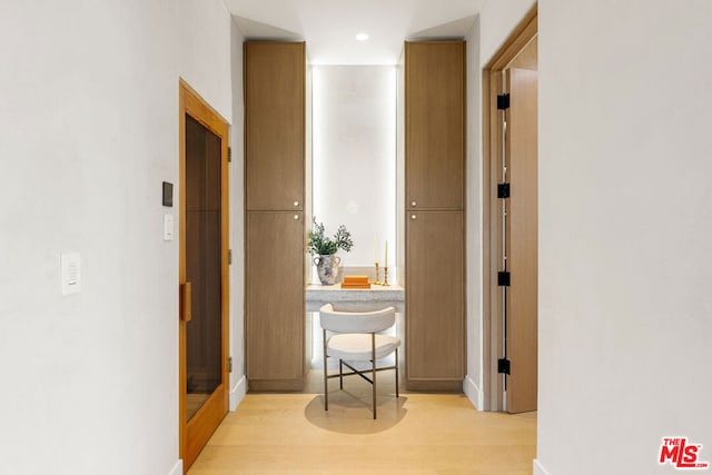 hall featuring light hardwood / wood-style floors