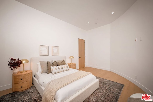 bedroom featuring hardwood / wood-style flooring