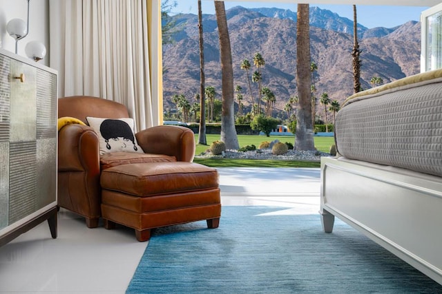 sitting room featuring a mountain view