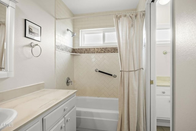 bathroom featuring vanity and shower / tub combo with curtain