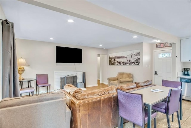 9022 Marlene Ave, Garden Grove, CA 92841 - living area with a brick fireplace, recessed lighting, and light wood finished floors