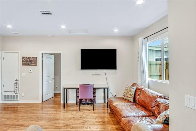 9022 Marlene Ave, Garden Grove, CA 92841 - living room with light wood-type flooring, recessed lighting, and baseboards