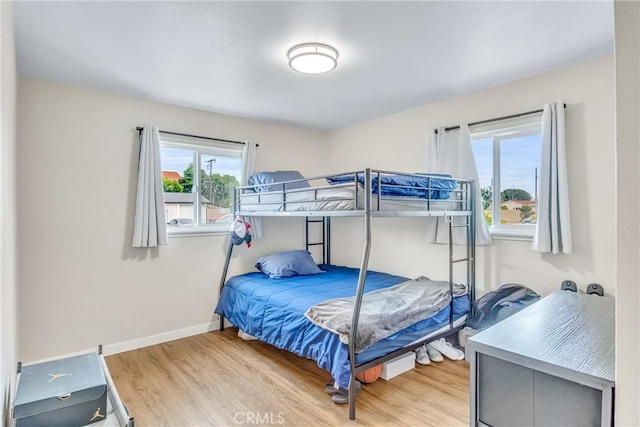 9022 Marlene Ave, Garden Grove, CA 92841 - bedroom featuring wood finished floors and baseboards