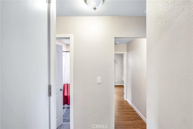 9022 Marlene Ave, Garden Grove, CA 92841 - corridor with wood finished floors and baseboards