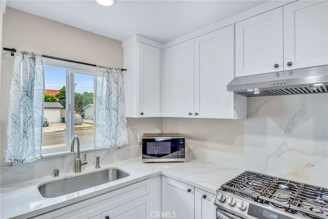 9022 Marlene Ave, Garden Grove, CA 92841 - kitchen featuring stainless steel appliances, a sink, under cabinet range hood, and white cabinets
