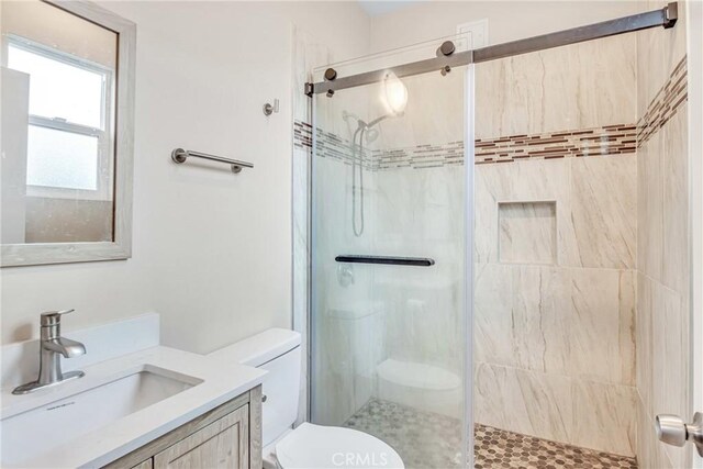 9022 Marlene Ave, Garden Grove, CA 92841 - bathroom featuring toilet, a stall shower, and vanity