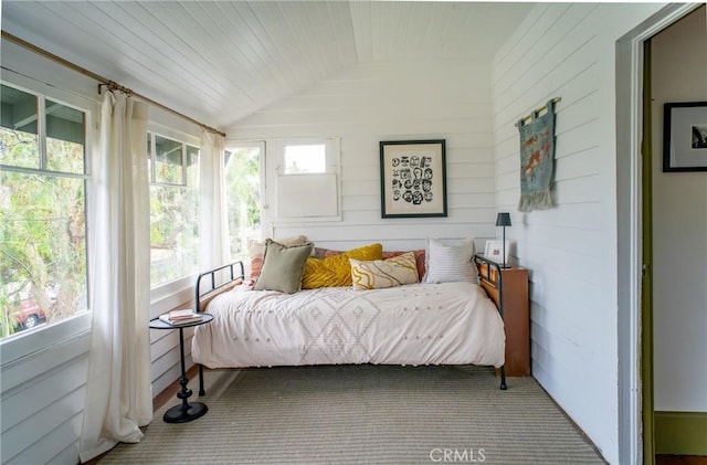 sunroom / solarium with vaulted ceiling and wooden ceiling