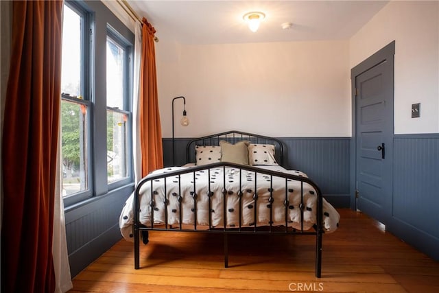 bedroom featuring hardwood / wood-style flooring