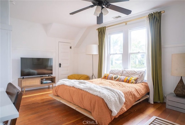 bedroom featuring ceiling fan and light hardwood / wood-style floors