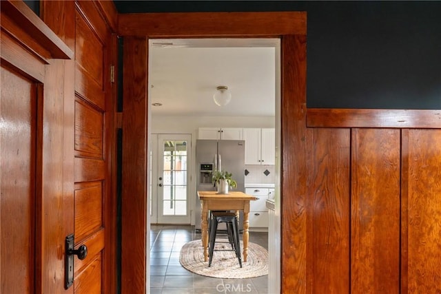 hallway featuring tile patterned floors