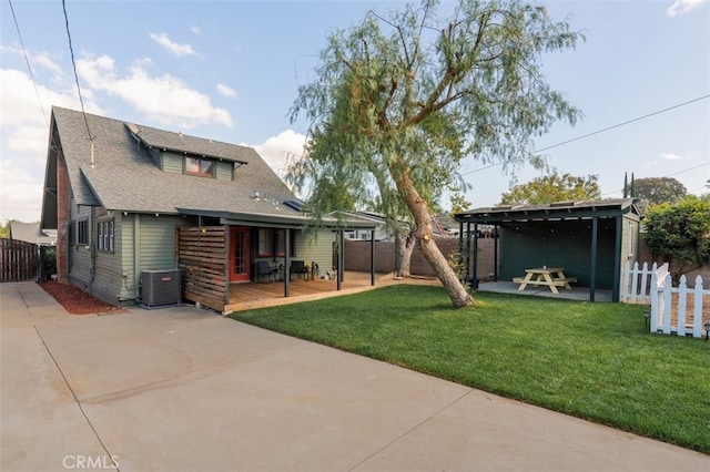 view of yard featuring cooling unit and a patio