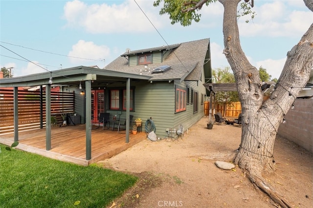 view of front of house featuring a wooden deck