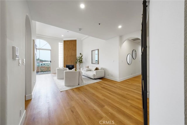 unfurnished living room featuring light hardwood / wood-style floors