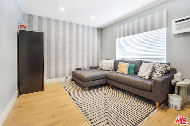 living room with hardwood / wood-style flooring