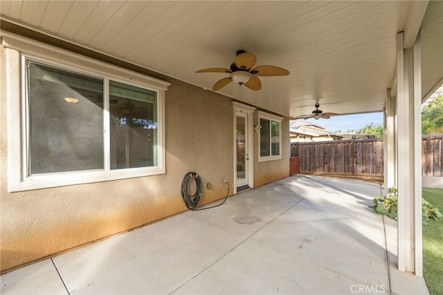 view of patio featuring ceiling fan