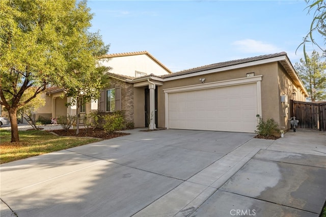 view of front of property with a garage