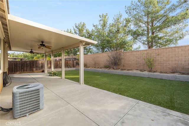 view of patio / terrace with ceiling fan and central AC unit