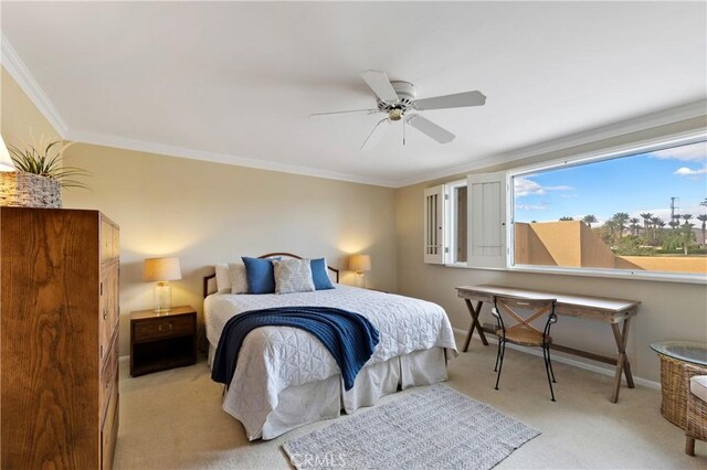 bedroom featuring ceiling fan, light colored carpet, and ornamental molding