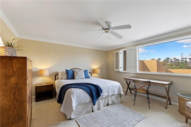 28 Pebble Beach Dr, Rancho Mirage, CA 92270 - bedroom with light carpet, ornamental molding, baseboards, and ceiling fan