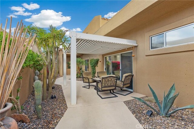 view of patio featuring a pergola