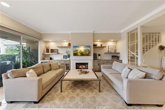 tiled living room with crown molding