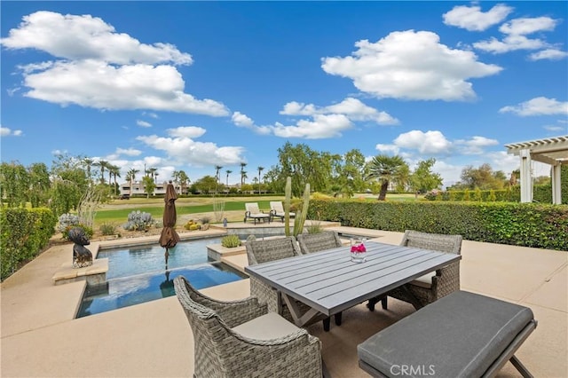 28 Pebble Beach Dr, Rancho Mirage, CA 92270 - view of patio / terrace featuring outdoor dining area, an outdoor pool, and a pergola