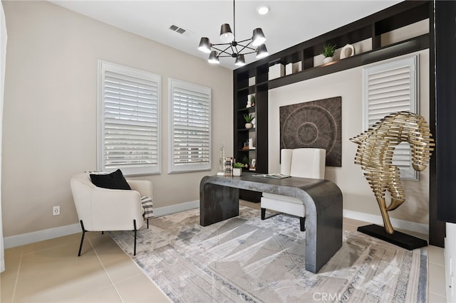 sitting room featuring light tile patterned floors and a notable chandelier