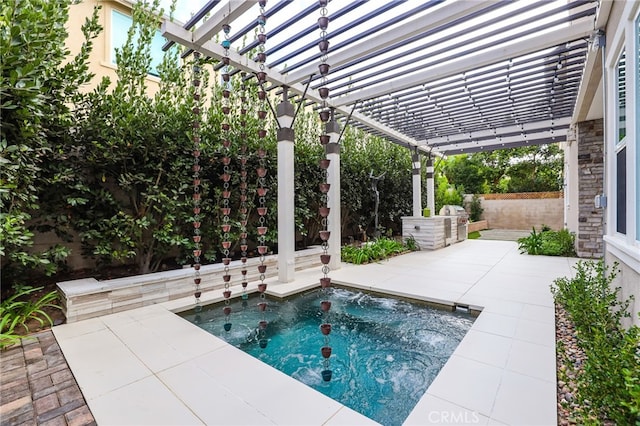 view of pool with a patio area and a pergola