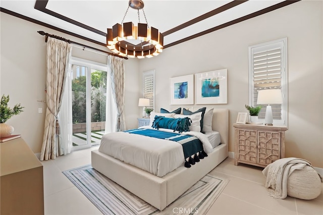 tiled bedroom featuring a chandelier and access to outside