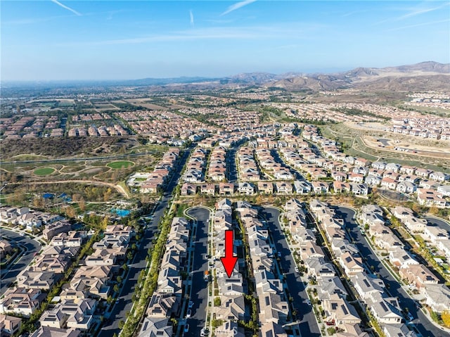 birds eye view of property featuring a mountain view