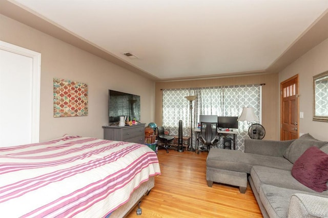 bedroom featuring wood-type flooring