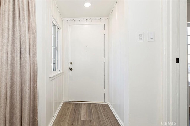 doorway featuring wood-type flooring