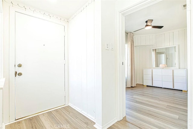 entrance foyer featuring ceiling fan and light hardwood / wood-style floors