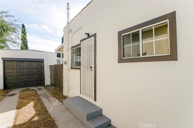 view of property exterior featuring a garage