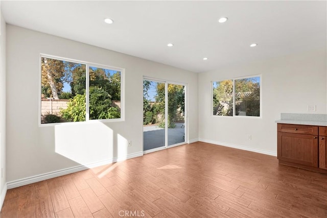 empty room with light wood-type flooring