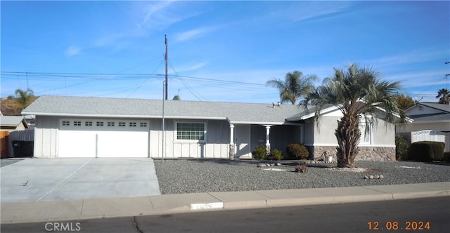 single story home with a garage