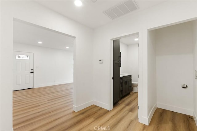 hallway featuring light hardwood / wood-style floors