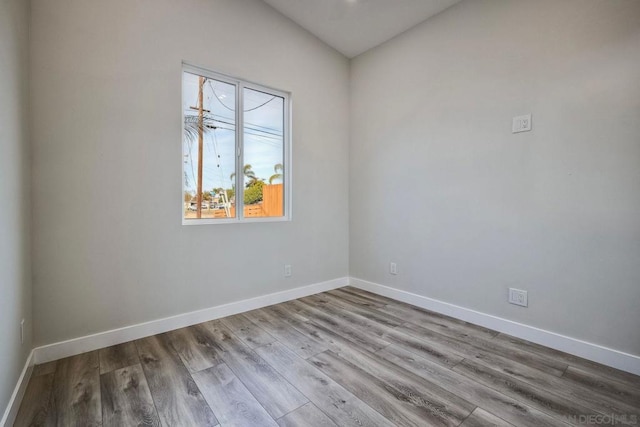 unfurnished room with light hardwood / wood-style flooring