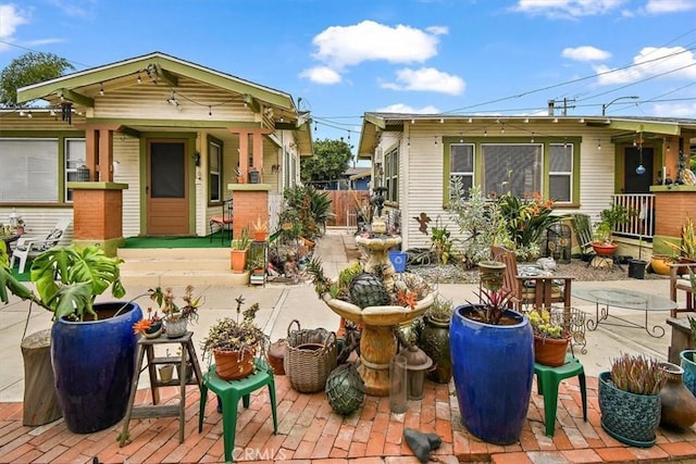 back of house with a patio area