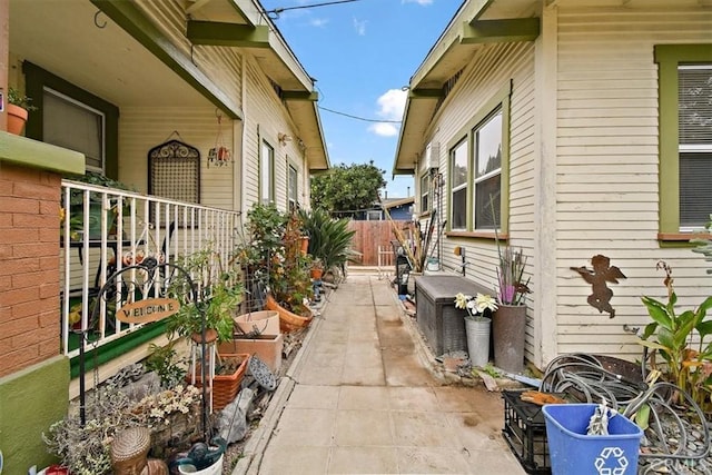 view of property exterior with a patio