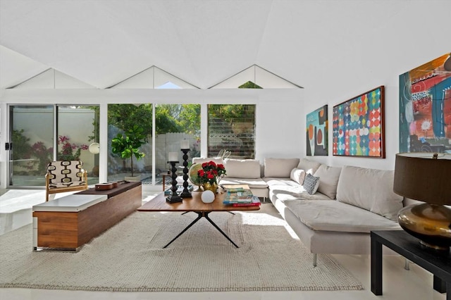 living room with lofted ceiling