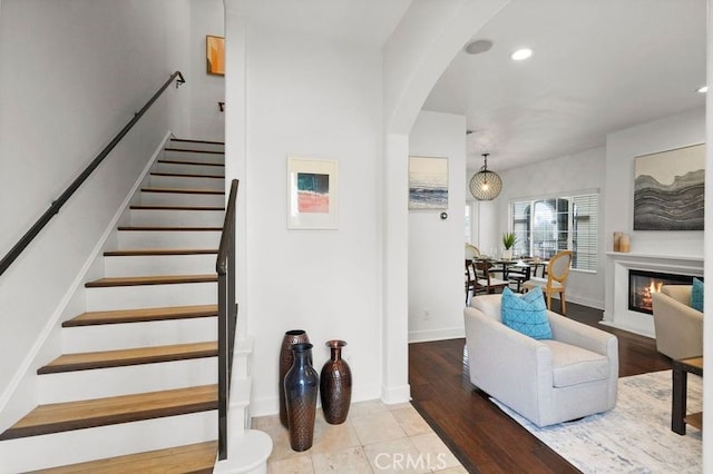 stairs with tile patterned flooring