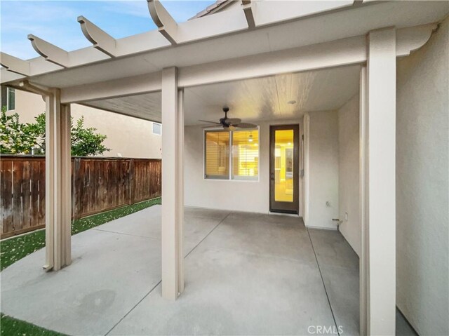 view of patio with ceiling fan