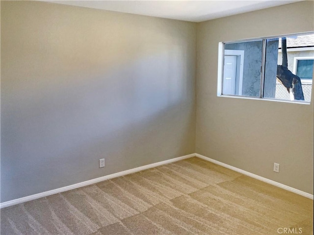 view of carpeted spare room