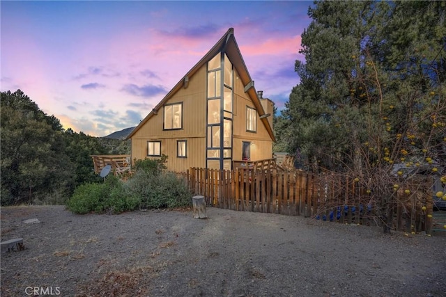 view of property exterior at dusk