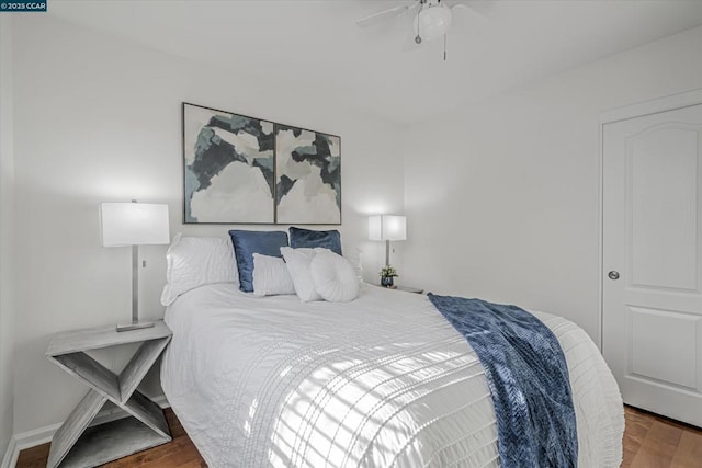 bedroom featuring ceiling fan and hardwood / wood-style floors