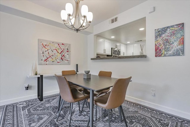 dining room featuring an inviting chandelier