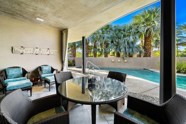 view of patio / terrace featuring a fenced in pool